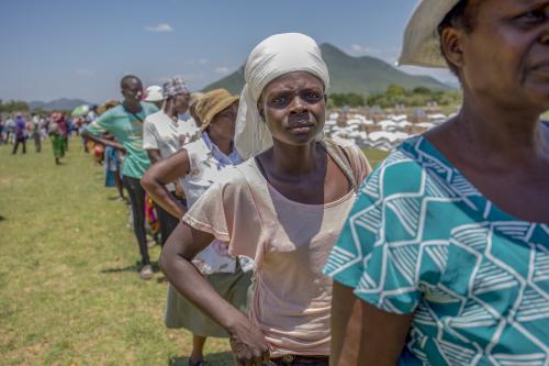 People queue at food distribution point in Makoni, Zimbabwe