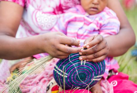 Women work together in an ActionAid supported cooperative in Rwanda.