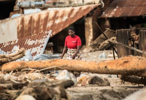 Director of Chigwirizano Women’s Movement and Action Aid partner Loveness Chiwaya is seen moving around Nkhulambe village, inspecting damage in the aftermath of Tropical Cyclone Freddy in Nkhulambe Village.