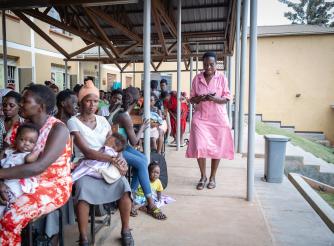 A nurse tending to patients in a health centre